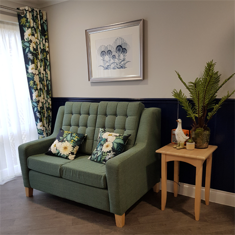 Case Study Image of curtains, sofa, scatter cushions, artwork and accessories to help you create a luxury feel to your care homes