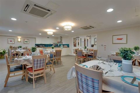 care home dining room with tables and chairs